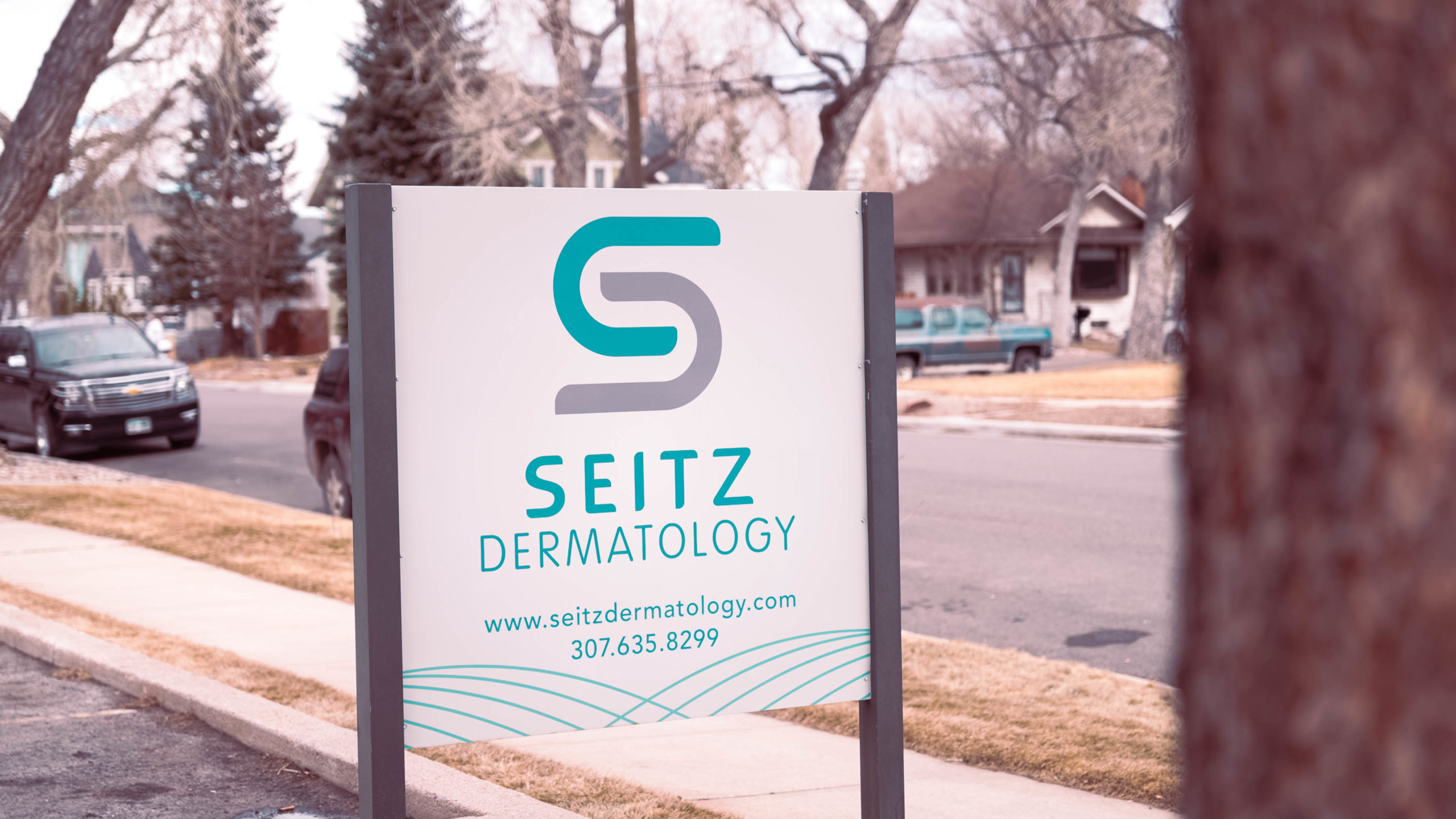 Seitz Dermatology sign on side of street