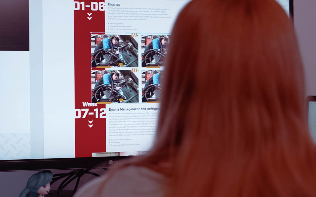 Woman developing a website on her screen