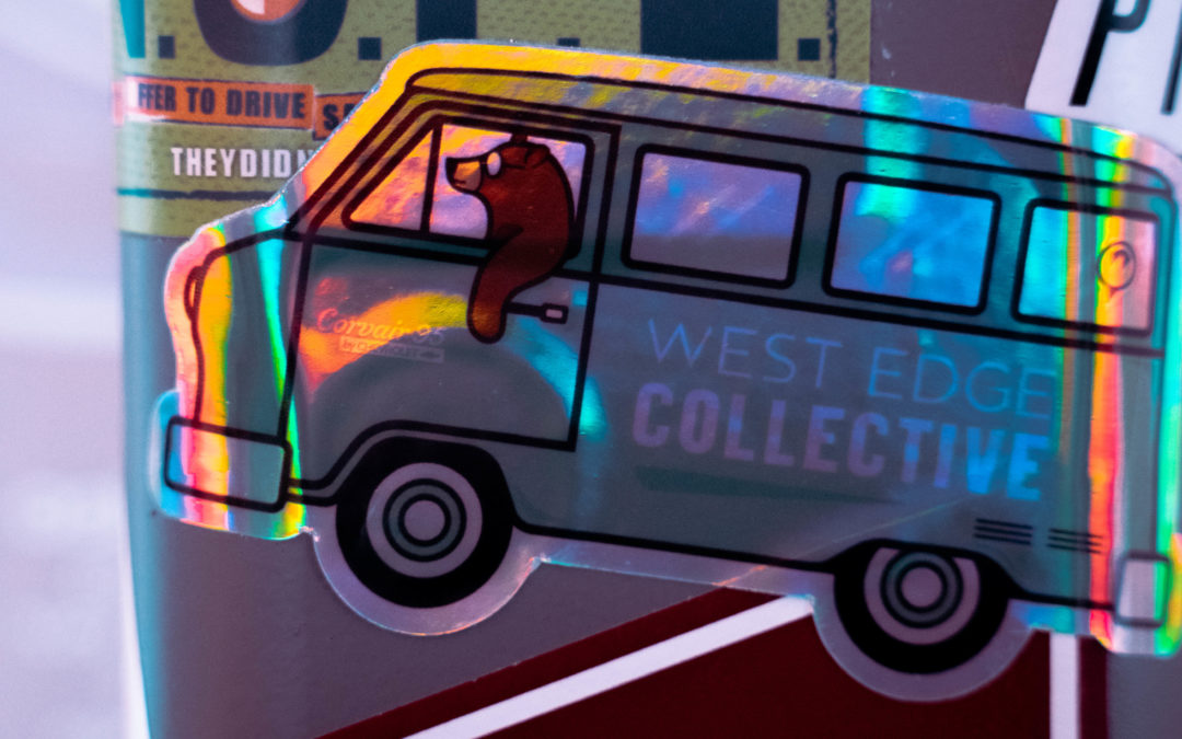 A sticker with a bear driving a van