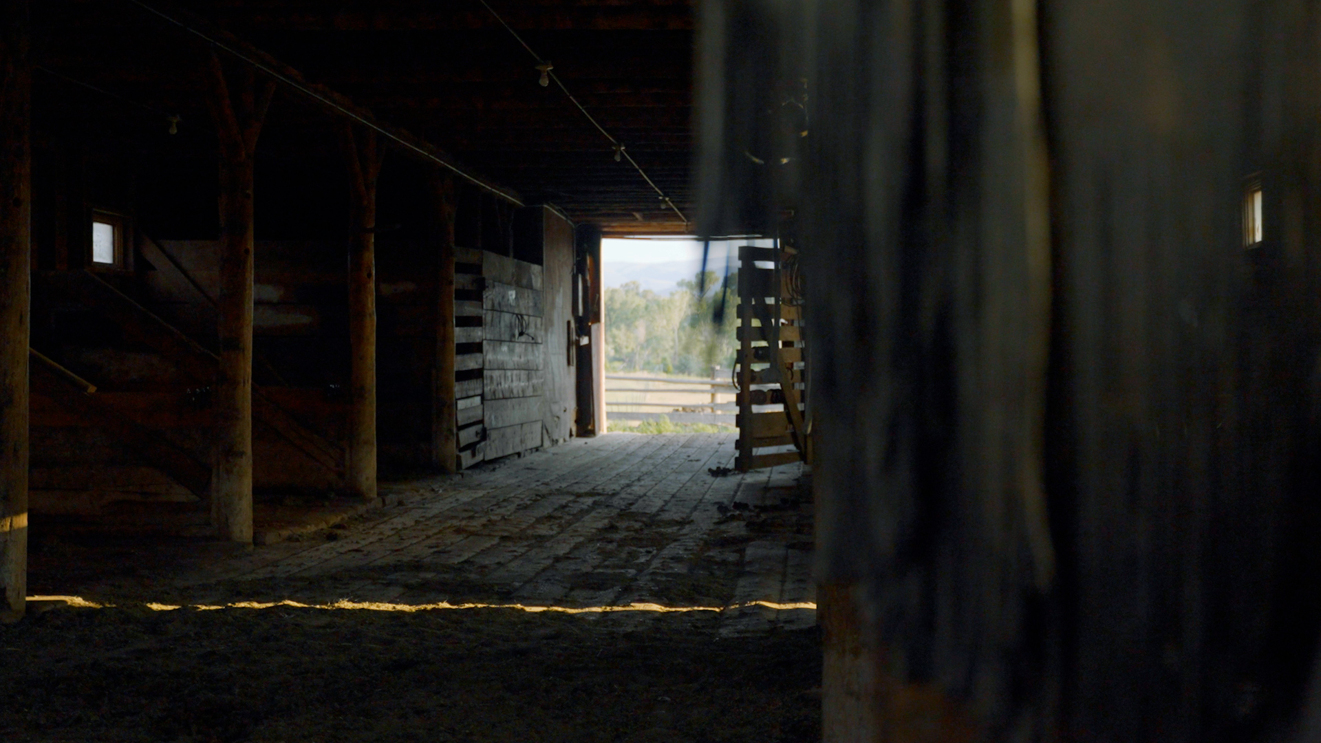 Inside of a wooden barn