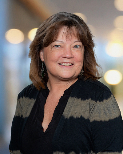Woman smiling on couch